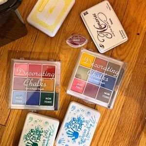 80 rubber stamps and 19 ink pads